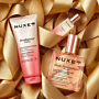 Nuxe Kultowy Prodigieux Florale: Huile Prodigieuse® Florale Suchy 50 ml + Perfumy Prodigieux® Floral 15 ml + Żel pod prysznic Prodigieux® 100 ml + Złota kopertówka